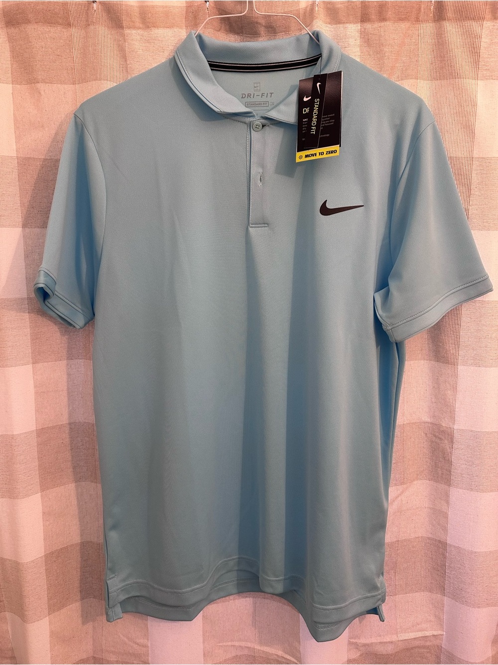 Nike Men’s Light Blue Polo Shirt with Black Swoosh